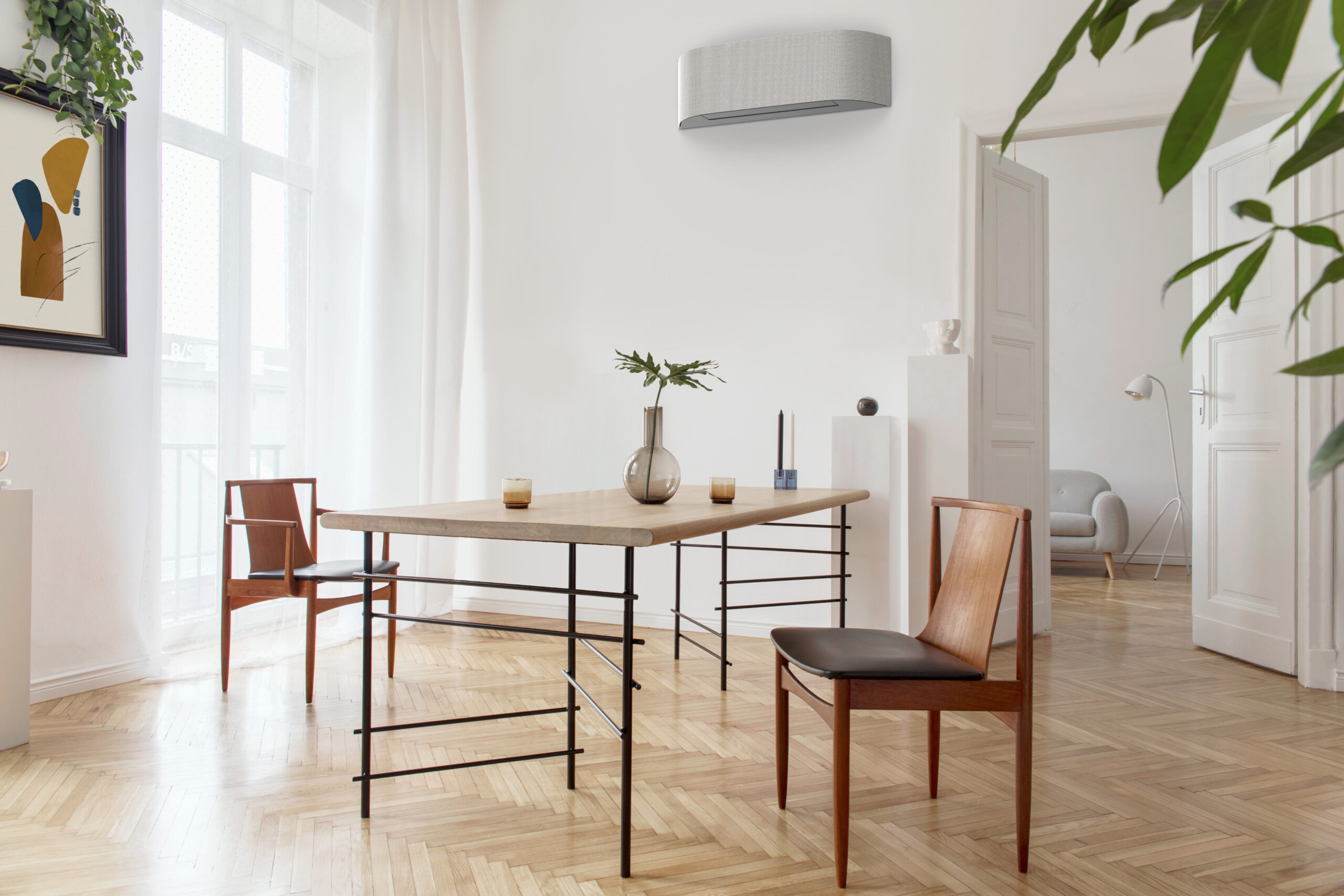 Climatiseur mural dans un séjour – entreprise AIM Solutions